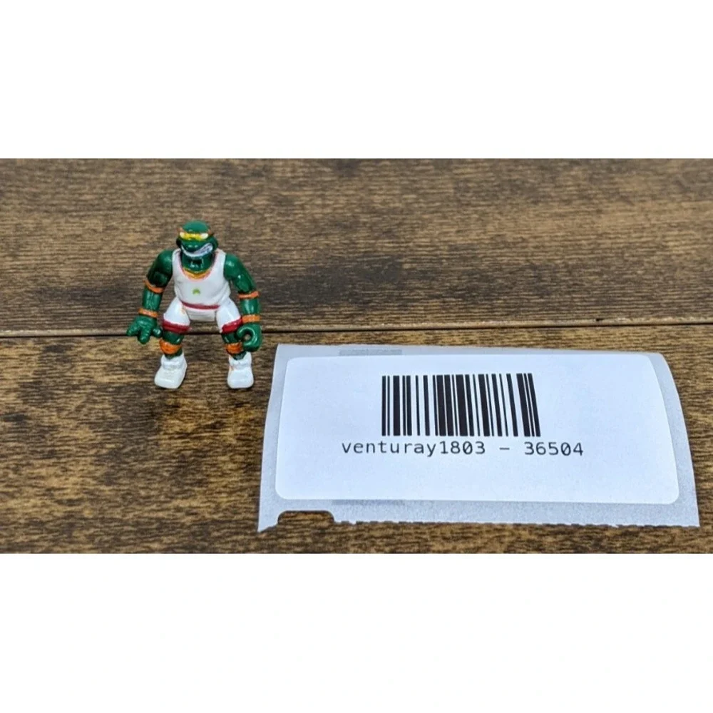 Vintage Teenage Mutant Ninja Turtles Leonardo Action Figure with Paint Wear‎